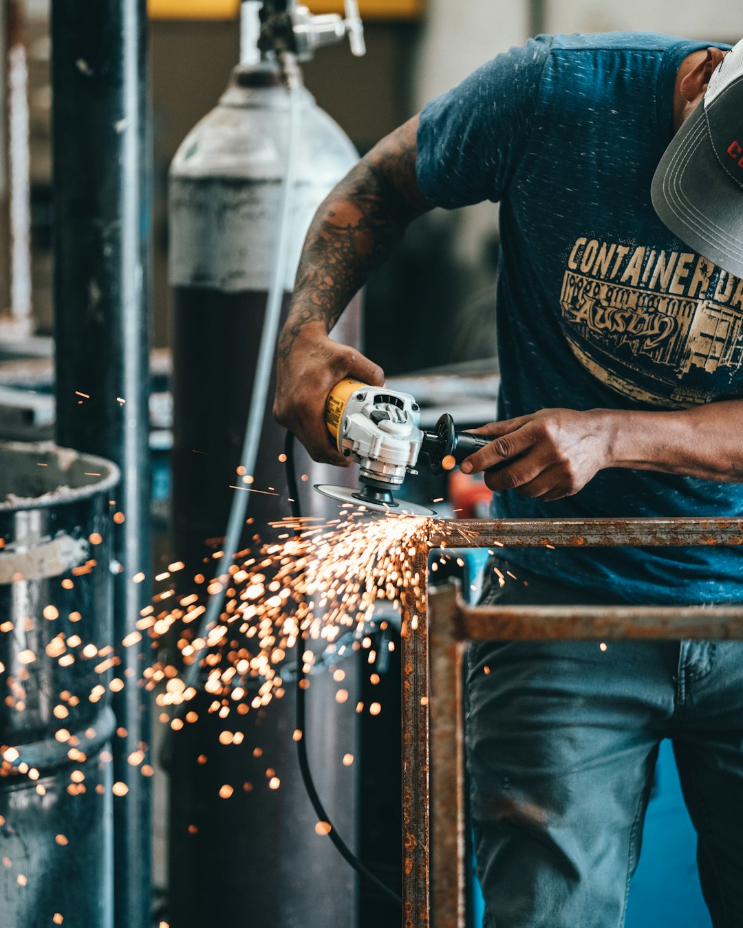 man-using-angle-grinder-yemsw57gya8